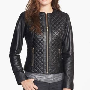 Cole Haan Women’s Quilted Faux Leather Jacket , crewneck style zip front.